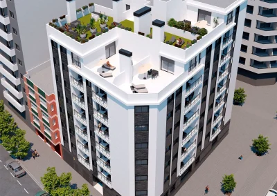 Vue aérienne de l'immeuble Panorama à Castellón, montrant des penthouses dotés de terrasses aménagées en jardin et de balcons vitrés.